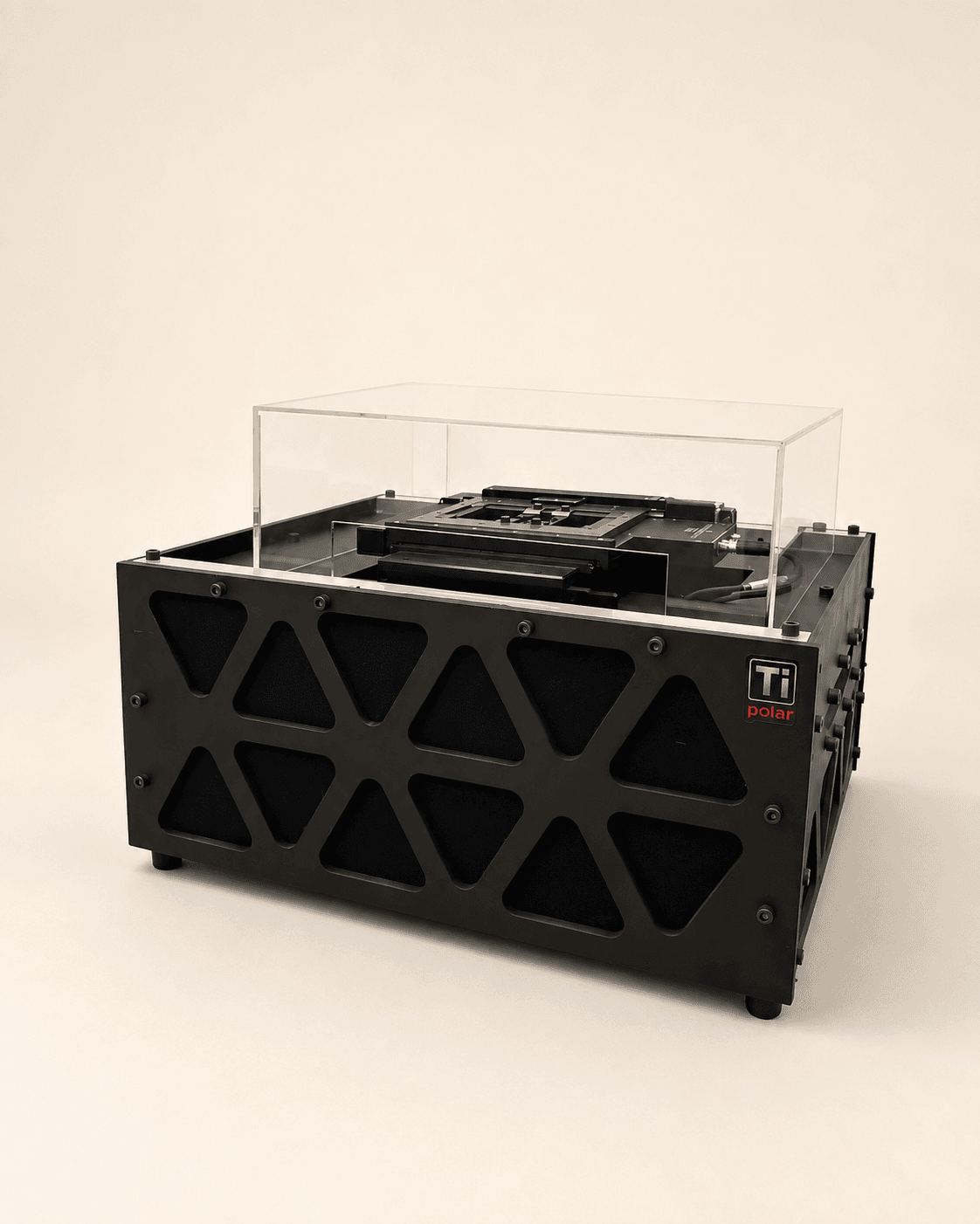 TiPolar three-quarter view showing the motorized XY stage and camera under the acrylic lid.